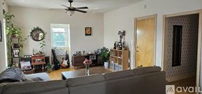 Philadelphia apartment for rent - A bedroom with a bed, dresser, and window.