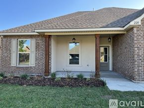 Youngsville house for rent - A house with the number 220 on the top right corner.