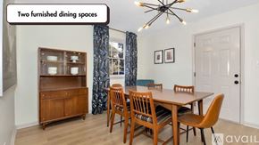 Huntsville apartment for rent - A dining room with a wooden table and chairs.