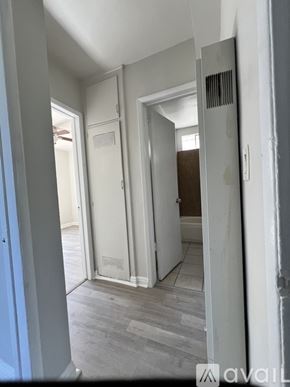 Los Angeles apartment for rent - A room with a white door and a grey floor.