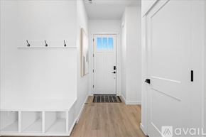 Caldwell house for rent - A room with wooden flooring and a window with blinds.