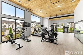 Caldwell house for rent - A gym with a variety of equipment including treadmills, stationary bikes, and weight machines.