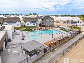 Caldwell house for rent - A pool area with a black fence and a gazebo.
