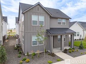 Caldwell house for rent - A pool area with a black fence and a gazebo.