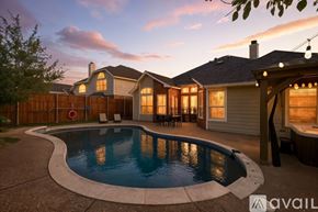 Haltom City house for rent - A house with a pool in the backyard.