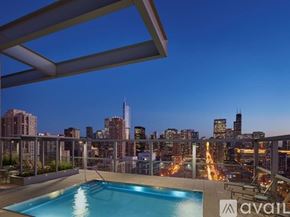 Chicago apartment for rent - A rooftop pool with a city skyline in the background.
