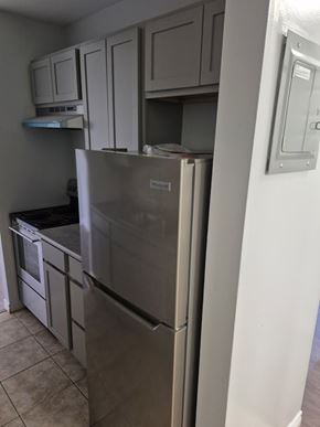 Dartmouth apartment for rent - A stainless steel refrigerator in a kitchen.