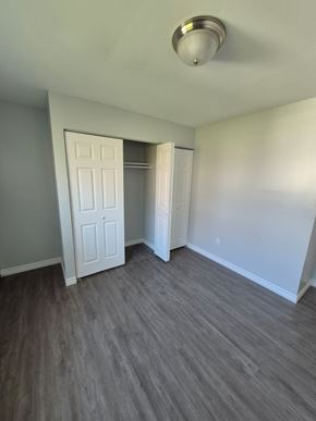 Dartmouth apartment for rent - A room with a white door and a light on the ceiling.