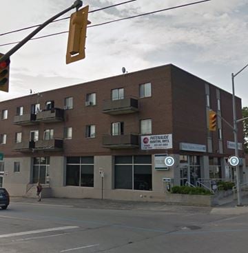 Kingston apartment for rent - A building with a sign that says "Gateway Fitness" on it.