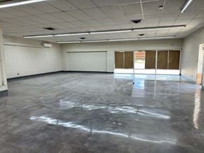Bay City apartment for rent - A large empty room with a sign on the wall.
