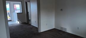 Everett apartment for rent - A room with a carpet floor and a window.