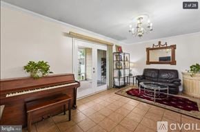 Manassas apartment for rent - A living room with a piano, a couch, and a mirror.