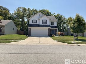 Mccordsville house for rent - A two-story house with a garage is for sale.