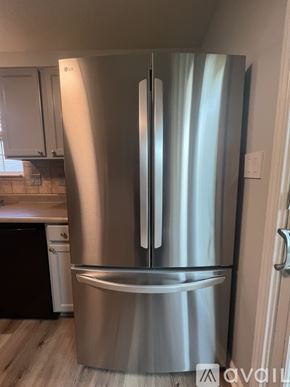 Mccordsville house for rent - A stainless steel refrigerator in a kitchen.