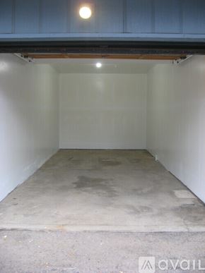Longmont apartment for rent - A large empty room with a concrete floor and white walls.