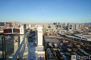 Las Vegas apartment for rent - A cityscape with the word "PALMS" prominently displayed on a building.