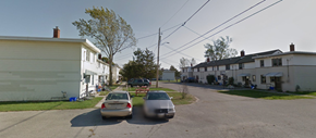 Picton apartment for rent - A street with cars and houses on both sides.