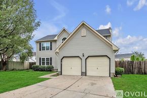Virginia Beach house for rent - A two-car garage is attached to a house.