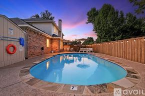 Lewisville house for rent - A pool with a 7 feet depth sign is in the foreground.