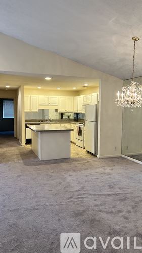 Louisville apartment for rent - A modern kitchen with a large island in the middle.