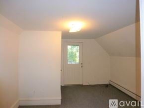 Burlington apartment for rent - A room with a door and a window.