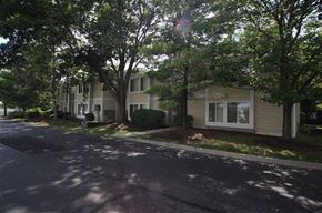 Cincinnati apartment for rent - a street in front of a house with trees
