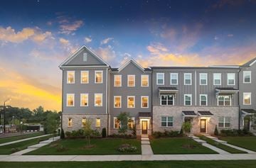 Cary house for rent - A modern apartment complex with multiple buildings and well-maintained lawns.