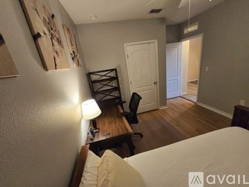 Davenport house for rent - A kitchen with a refrigerator, microwave, and oven is available for rent.