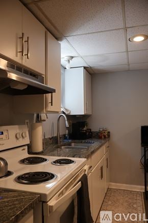 Smithfield apartment for rent - A living room with a couch, coffee table, and television.