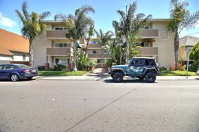 San Mateo apartment for rent - a jeep parked in front of an apartment building