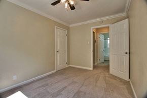 Mountain View apartment for rent - A room with a ceiling fan and carpeted floor.