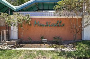 Redwood City apartment for rent - A Monticello sign is on a building.
