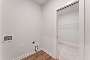 Maple Grove house for rent - A white room with a doorway leading to another room.