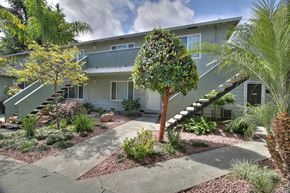 Sunnyvale apartment for rent - a house with stairs and a garden in front of it