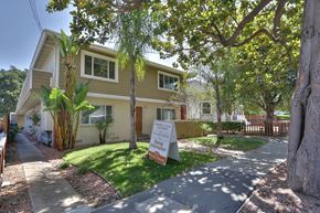 Palo Alto apartment for rent - a house with a sign on the lawn in front of it