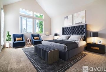 San Diego apartment for rent - A bedroom with a large bed and a window with blinds.