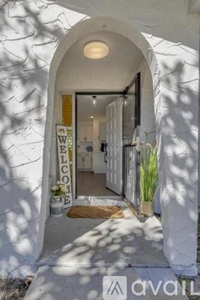 Palm Coast house for rent - A white building with a "Welcome" sign on the door.