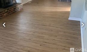 Knoxville house for rent - A room with wooden flooring and a fireplace.