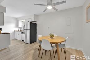 Newburgh apartment for rent - A kitchen with a dining table and chairs.