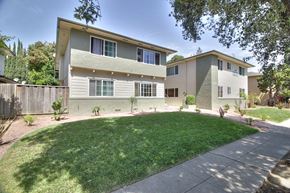 Sunnyvale apartment for rent - A two-story building with a green lawn in front.