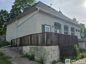 Clare house for rent - A room with a white cabinet and a window.