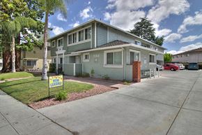 Sunnyvale apartment for rent - A building with a leasing sign in front of it.