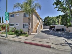 Mountain View apartment for rent - a building with stairs and a driveway in front of it