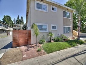 Mountain View apartment for rent - the front of a house with a yard and a sidewalk