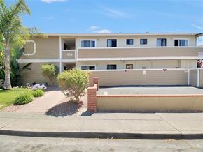 Mountain View apartment for rent - the front of an apartment building with a sidewalk in front of it