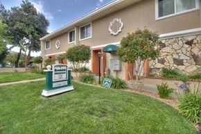 Mountain View apartment for rent - A building with a sign that says Brooksdale Estates in front of it.
