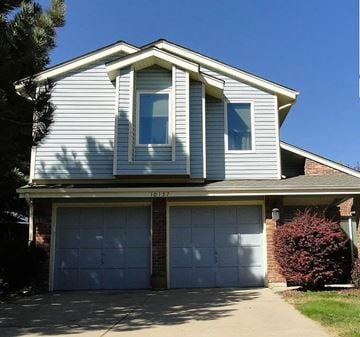 Westminster house for rent - A two-story house with a garage.