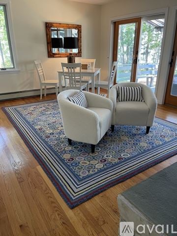 Freeport house for rent - A living room with two chairs and a table.