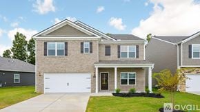 Cleveland house for rent - A two-story house with a garage is for sale.