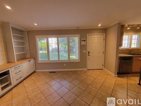 Sebastopol house for rent - A kitchen with wooden cabinets and stainless steel appliances.